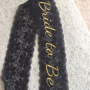 Bridal sash with gold lettering and lace